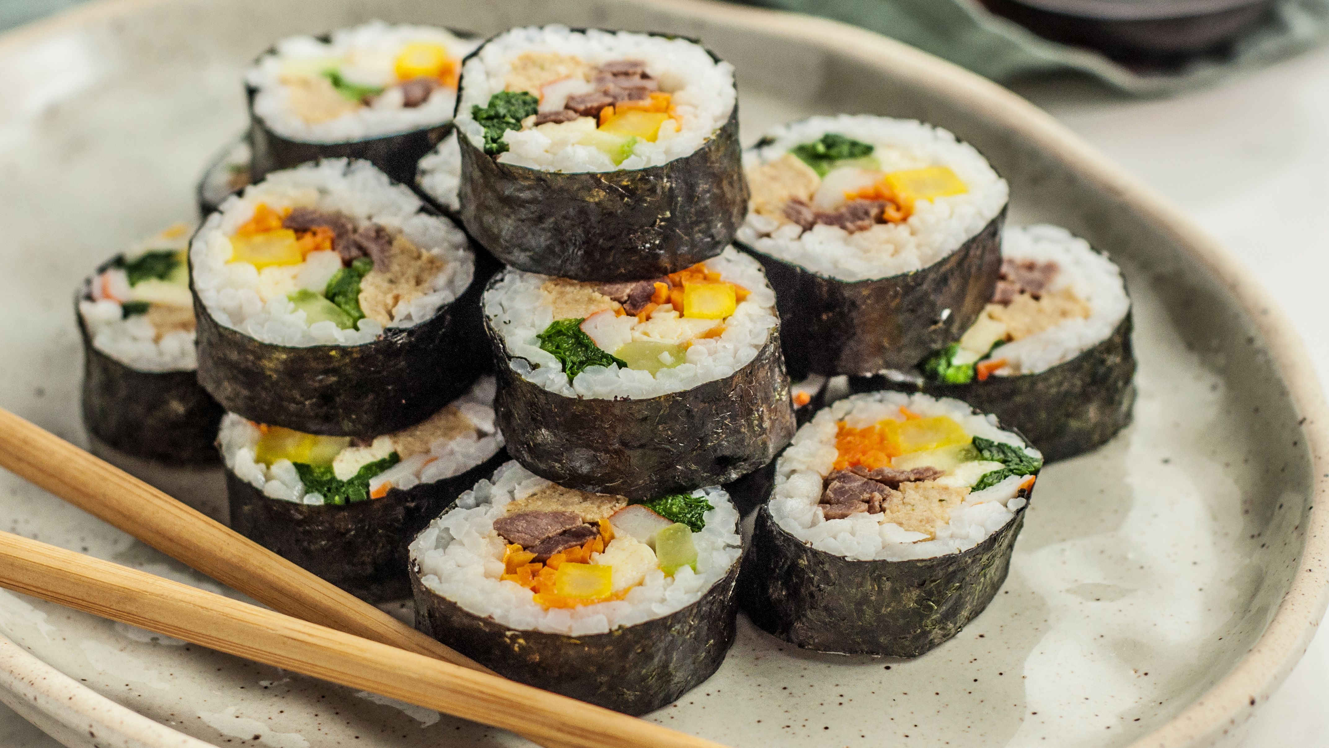kimbap-korean-sushi-rolls-2118795-Hero-5b7dbdd346e0fb00250718b8.jpg