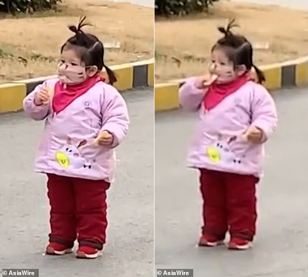 Cô bé gây bão mạng vì cố gắng ăn bánh khi đang đeo khẩu trang - Ảnh 1.