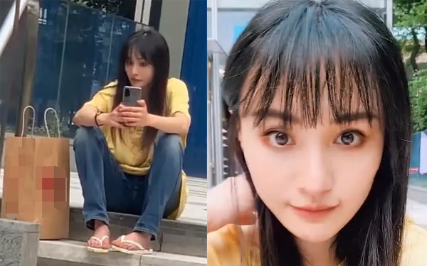 Bắt gặp cảnh Trịnh Sảng đi dép tông ngồi bậc cầu thang vỉa hè chụp ảnh