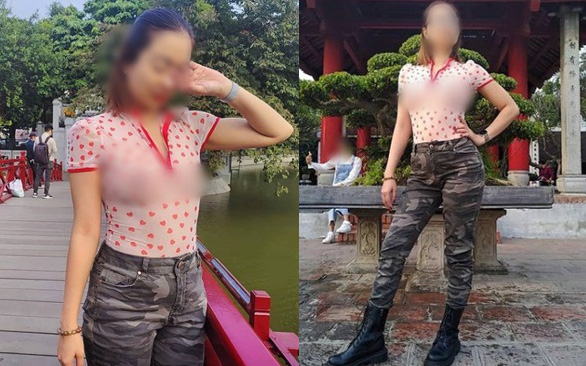 Người phụ nữ &quot;thả rông&quot; đi khắp Sài Gòn cùng chồng con lại tiếp tục mặc áo xuyên thấu khoe ngực trần tạo kiểu khó hiểu trước Đền Ngọc Sơn