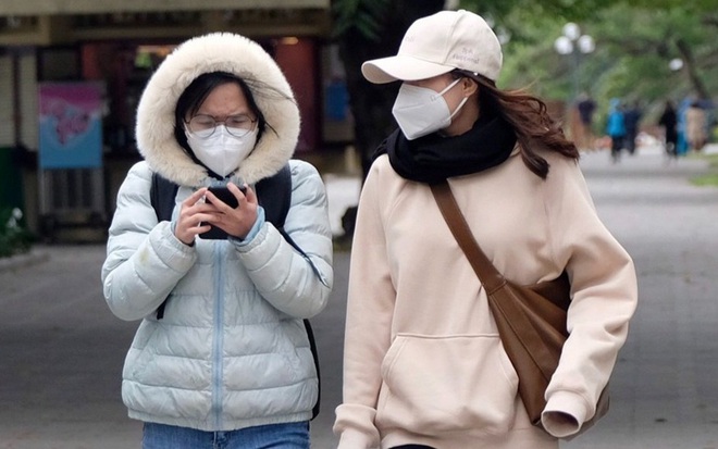 Không khí lạnh rất mạnh tràn về, Hà Nội nền nhiệt giảm 10 độ, trời chuyển mưa rét - Ảnh 1.