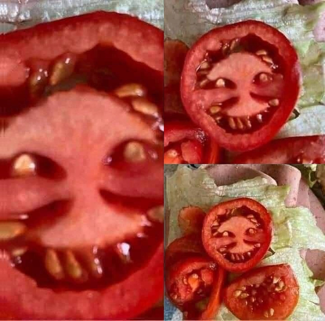 Chưa đến Halloween mà cô gái đã có một phen đứng tim với quả cà chua "mặt quỷ" khi đang mải mê vào bếp nấu ăn - Ảnh 1.